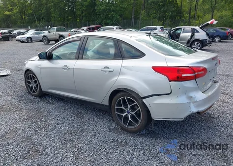 2017 Ford Focus Sel z USA, uszkodzony, nr VIN 1FADP3H2XHL287111